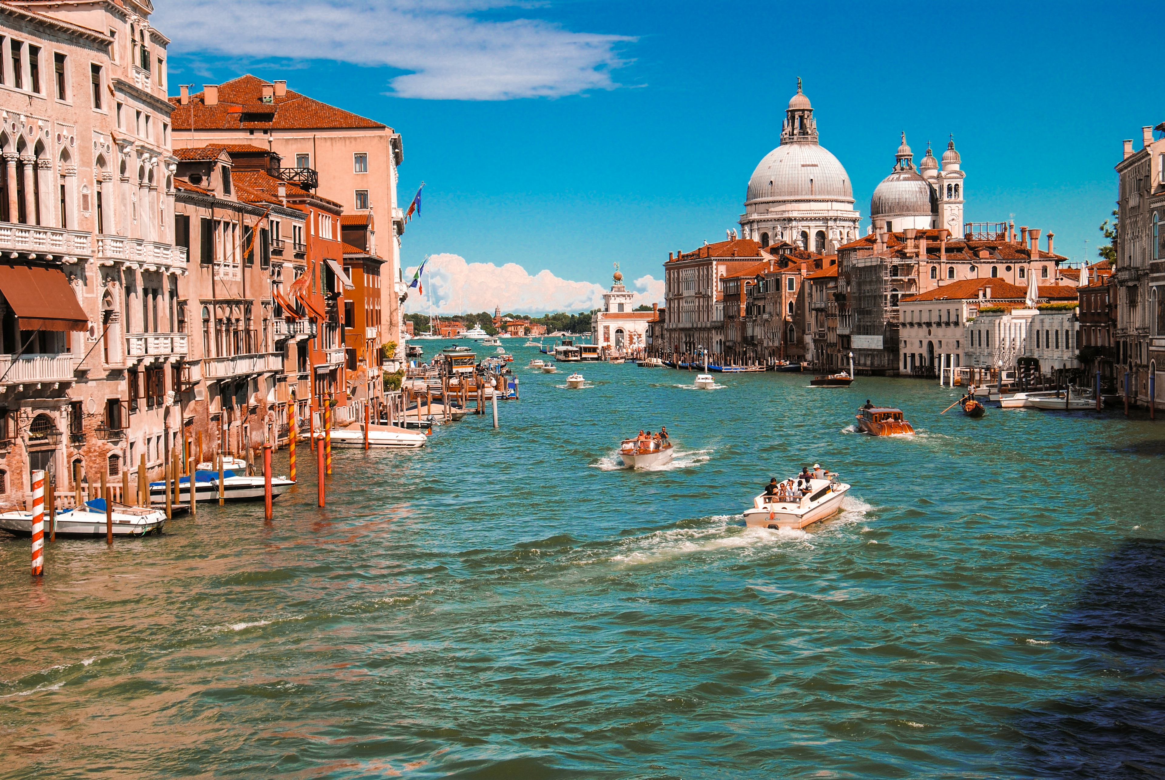Venice Grand Canal Gondola Ride - Enclosed baroque Bridge of Sighs spanning over narrow canal between Doge Palace and prison Venice